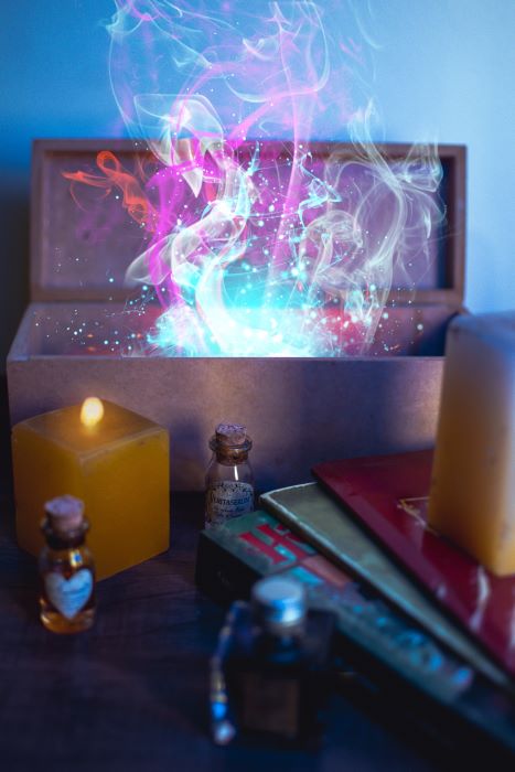 Magical things, including coloured mist coming out of a magic box