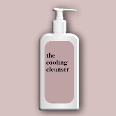 jwskin white cleanser container on pink background with label reading the cooling cleanser 