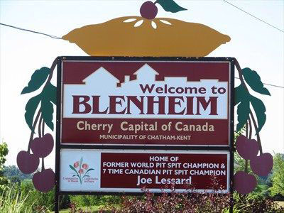 welcome to Blenheim sign, cherry capital of the world, giant cherry pie ontop of the sign