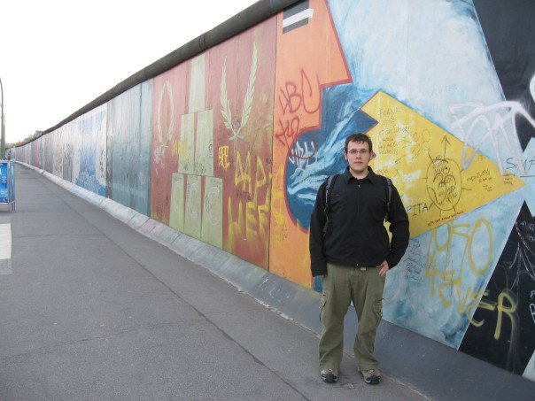 me in front of the berlin wall